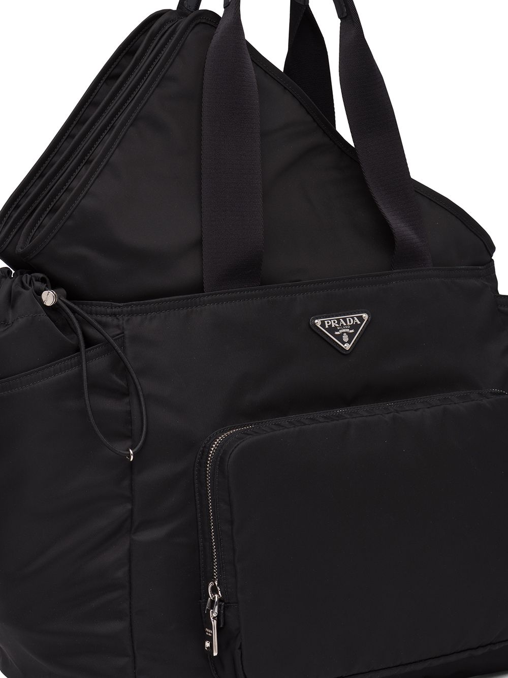 Pra*a enamel logo plaque changing bag